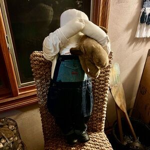 Amish doll holding teddy bear- appears to be vintage.